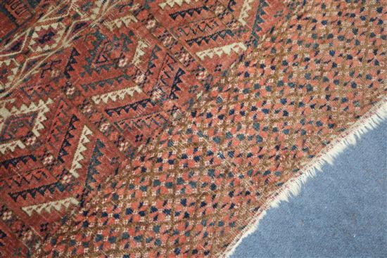 A Bokhara red ground rug 125 x 150cm